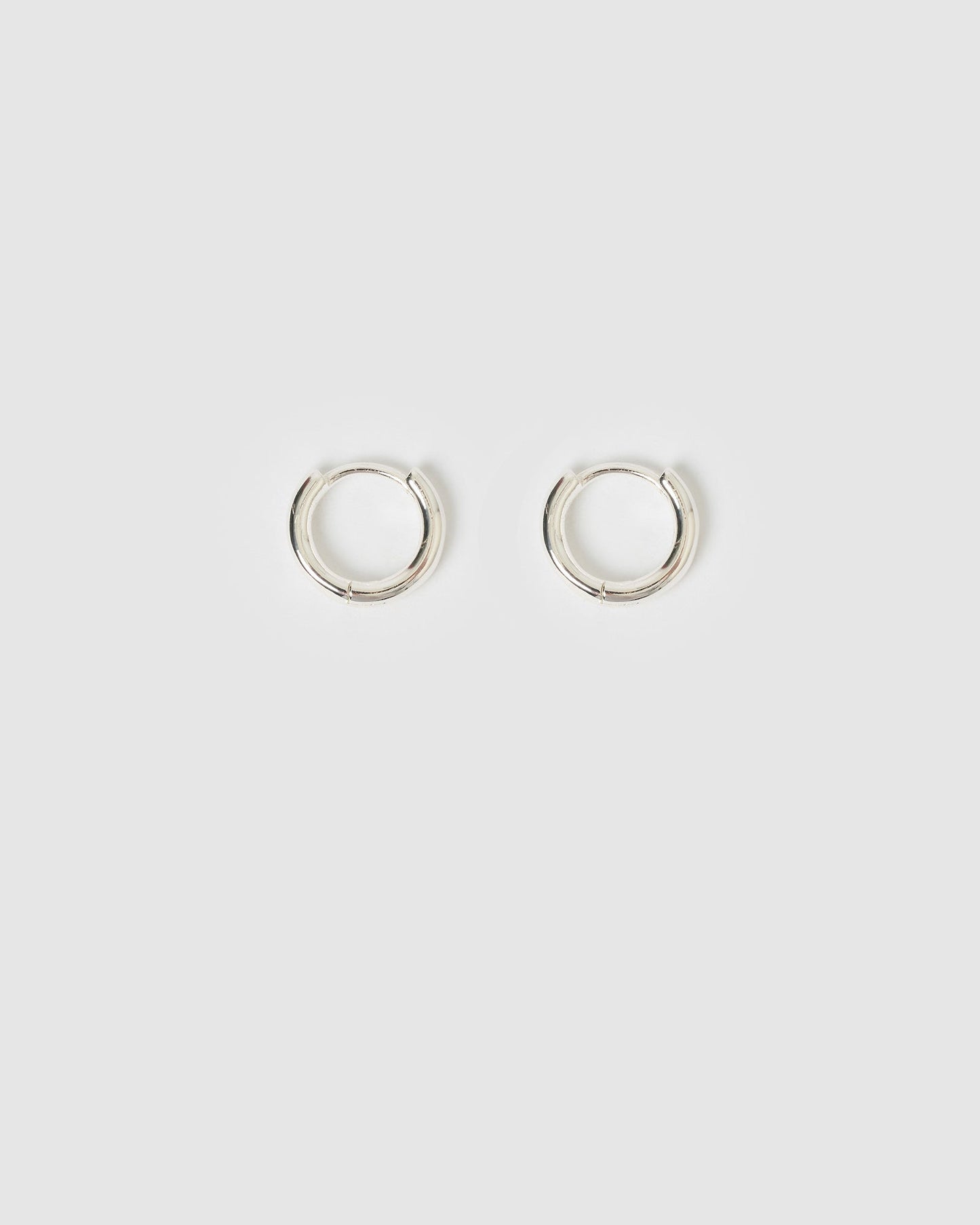 Shia Silver Huggie Earrings