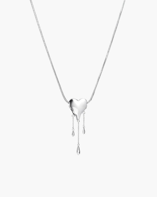 Venom’s Golden Drip Heart Necklace in Silver